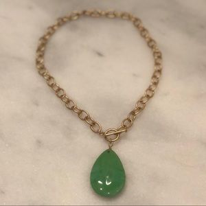 Gold toggle chain statement necklace - green stone
